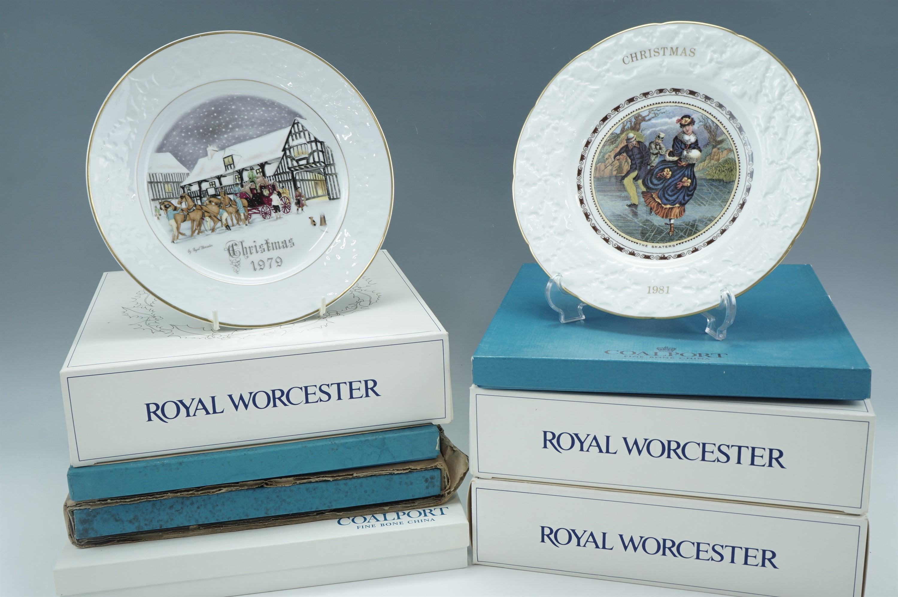 A Coalport Queen Elizabeth II Silver Jubilee plate, three Coalport Christmas plates, and three by