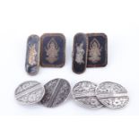 A set of vintage Siamese or similar niello and white metal cufflinks, stamped "Sterling Kwang An",