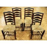 Four late 19th / early 20th Century rush-seated ladder-back chairs