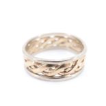 A two-colour 9 ct gold openwork wedding band, 2.8 g