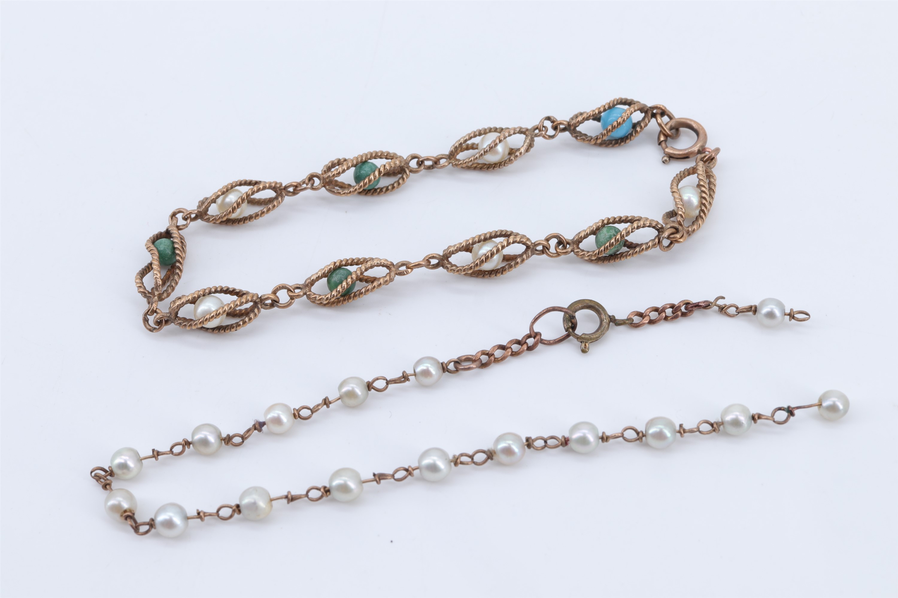 A vintage 9 ct gold, pearl and turquoise bead bracelet, the pearls and beads captive within spiral