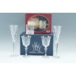 A boxed set of Bohemia Crystal wine glasses, together with a similar set of Royal Crystal Rock