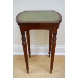 A reproduction mahogany lamp table, having an inset gilt-tooled green leather top, 41 cm x 32 cm x