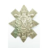 A Victorian Black Watch cast bonnet badge