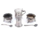 A Victorian pierced silver mustard pot, together with two silver salt cellars and a silver