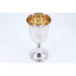A Victorian influenced silver chalice, of plain form with a flared pedestal base and a central knop,