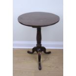 A late Georgian mahogany and oak tripod wine or tea table, 55 cm x 74 cm