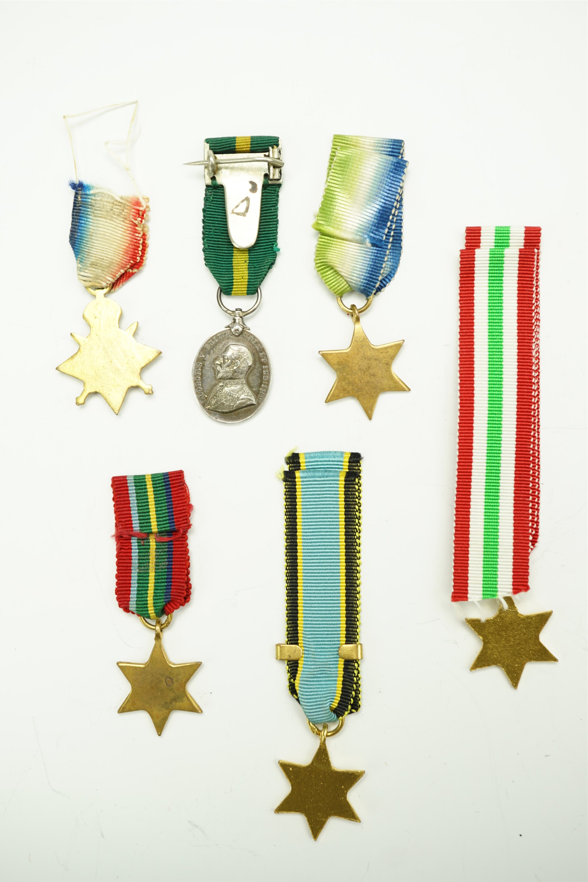 A miniature George V Territorial Force Efficiency medal together with other miniatures - Image 2 of 2