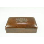 A Royal Flying Corps carved table cigarette box, 8.5 cm x 11.5 cm x 5.5 cm