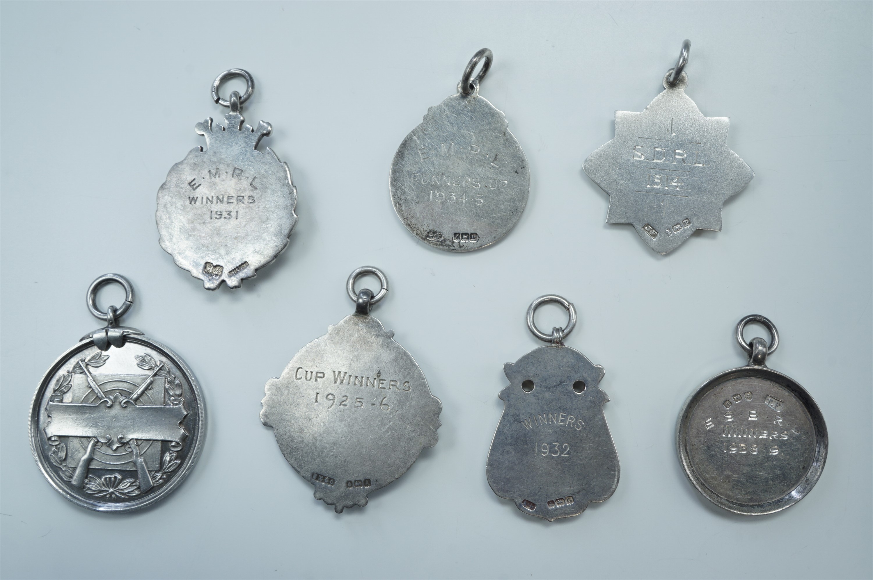 Seven silver target shooting fob medals, 1910 - 1938, including Montgomeryshire Air Gun League, 82 - Image 2 of 2
