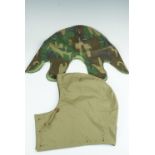A US army M43 Field Jacket hood, together with helmet cover and camouflage veil