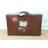 An early 20th Century "Revelation" hide suitcase, bearing Cunard White Star Line labels, 63 cm x