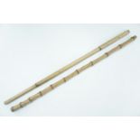 Two bamboo swagger sticks