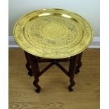 A Chinese brass-topped folding table, 50 cm x 58 cm high