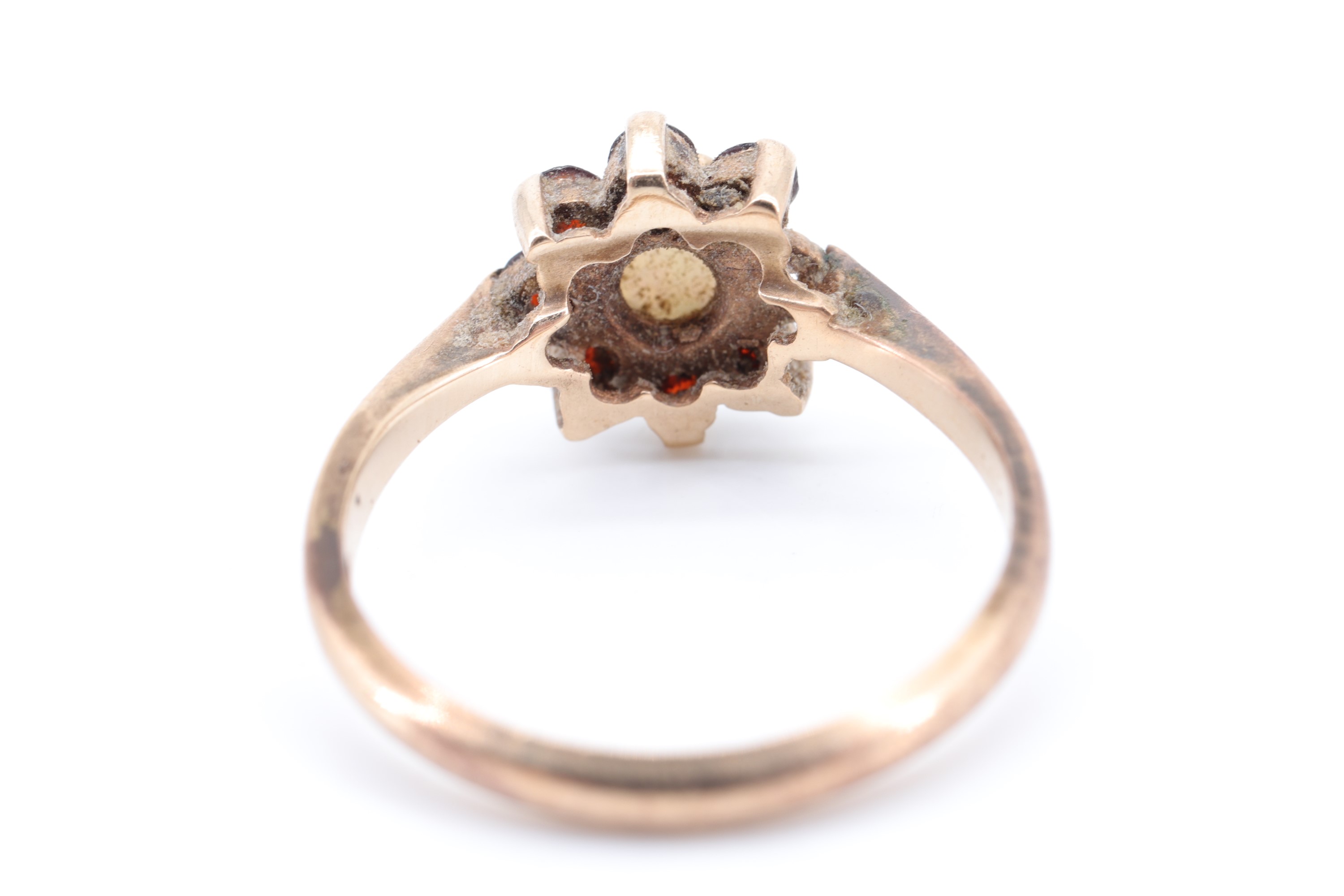 An opal and garnet flowerhead cluster ring, the opal cabochon of 5 mm diameter, set on 9 ct gold, M, - Image 3 of 3
