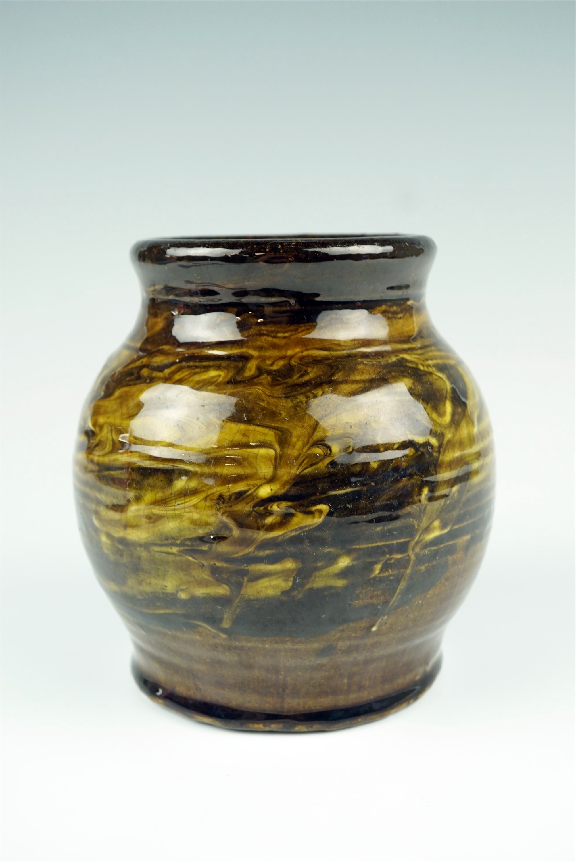 Reginald Fairfax Wells (1877-1951), a Coldrum Pottery slipware vase, 15 cm