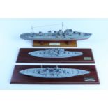 Two diecast model battleships, HMS King George V and HMS Warspite, plinth 40 cm x 9 cm, together