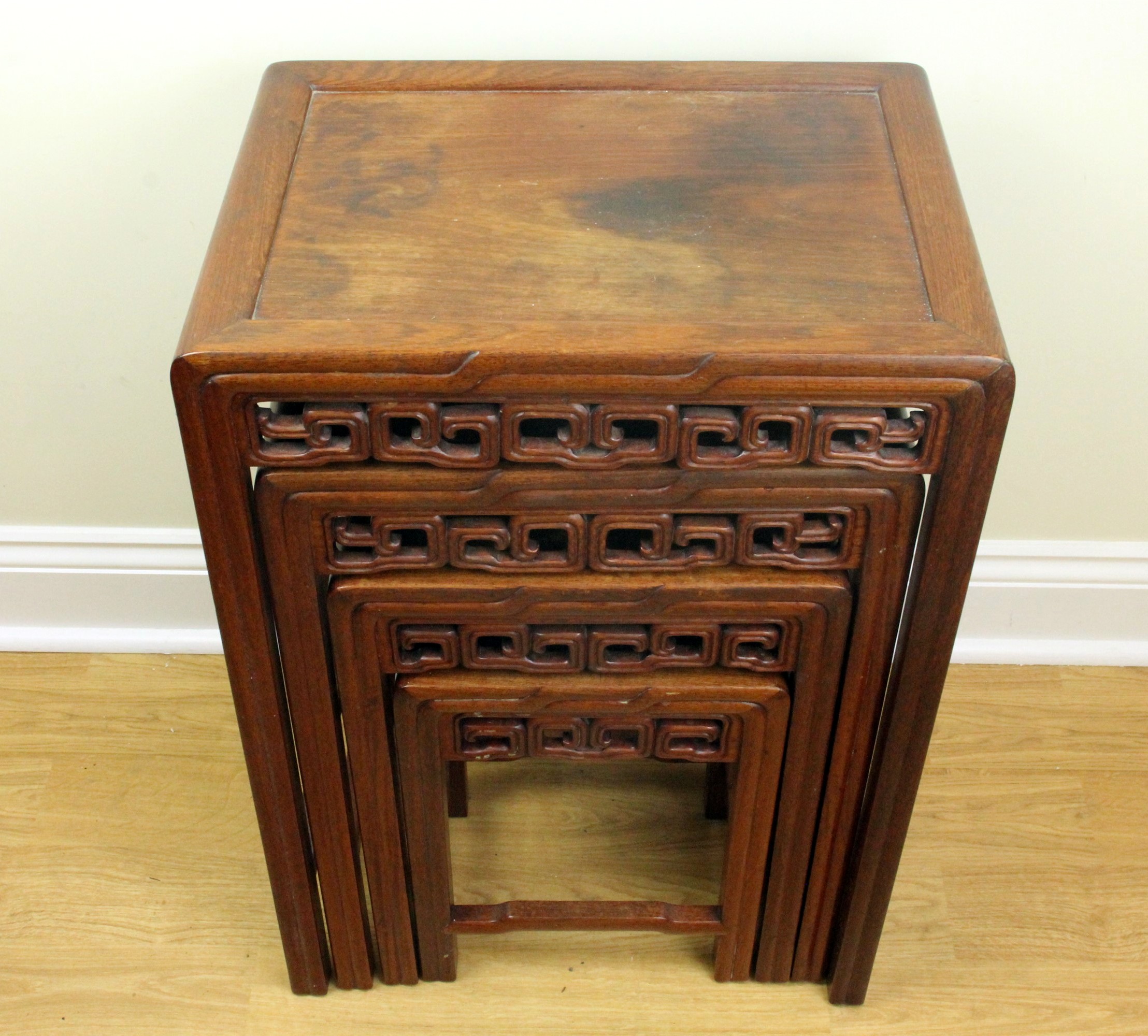 A 20th Century Chinese carved hongmu next of tables, 48 cm x 34 cm x 71 cm high