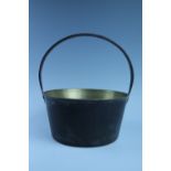 A brass jam pan, 29 cm