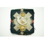 A George V - VI Highland Light Infantry warrant officer's cap badge by Anderson of Edinburgh