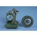A gilt metal and onyx combined pen rest and desk clock, modelled as Cupid with his bow, third