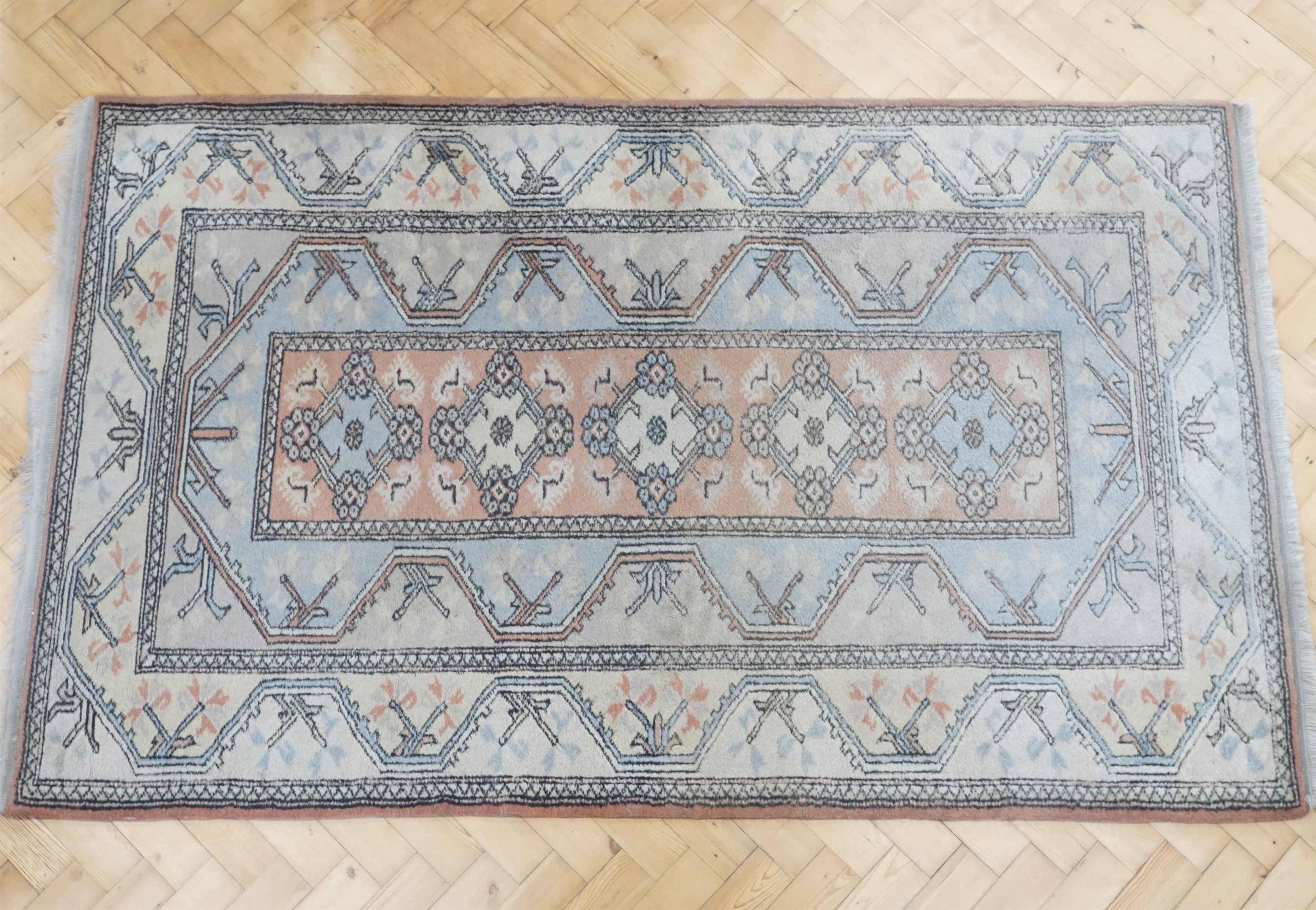 A Turkish wool pile rug, 200 x 120 cm