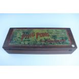 An early 20th Century J Jacques cased Ping Pong (or Gossing) table top parlour game, in