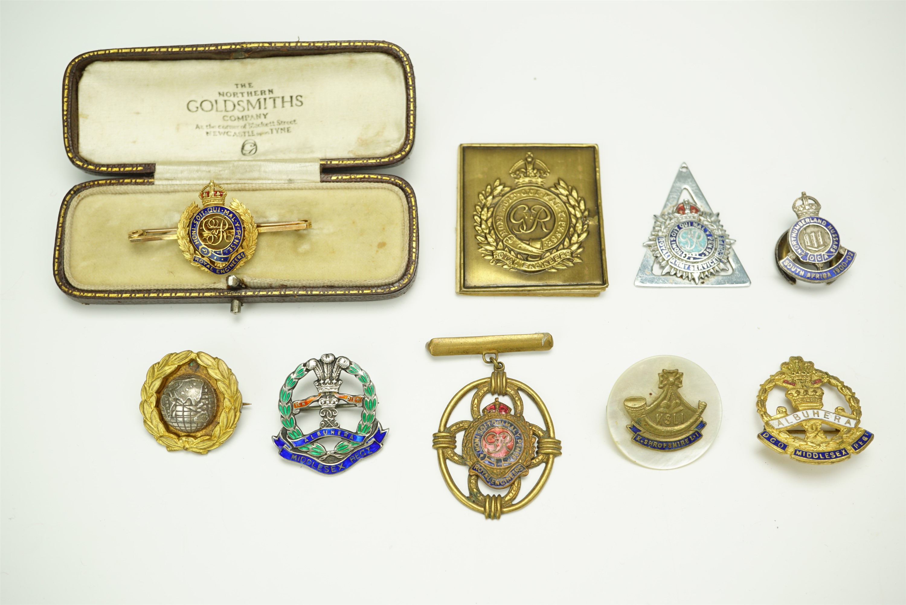 A Middlesex Regiment enamelled white metal sweetheart brooch (stamped silver), together with a cased