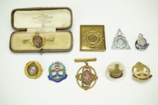 A Middlesex Regiment enamelled white metal sweetheart brooch (stamped silver), together with a cased
