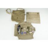A 1941 British Home Front Civilian Duty gas mask haversack together with a military washing and