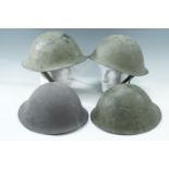 Four various British Mk 4 and Mk 5 steel helmets