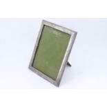 A 1940s silver faced photograph frame, 19.5 x 24.5 cm