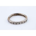 A yellow metal eternity ring, late 20th Century, size J, 1.64 g