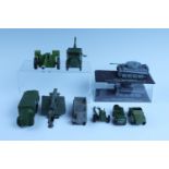 Six Dinky Toys military vehicles, comprising a Scout Car No. 673, an Armoured Command Vehicle No.