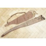 Two vintage Brady leather-trimmed canvas shotgun / rifle slips