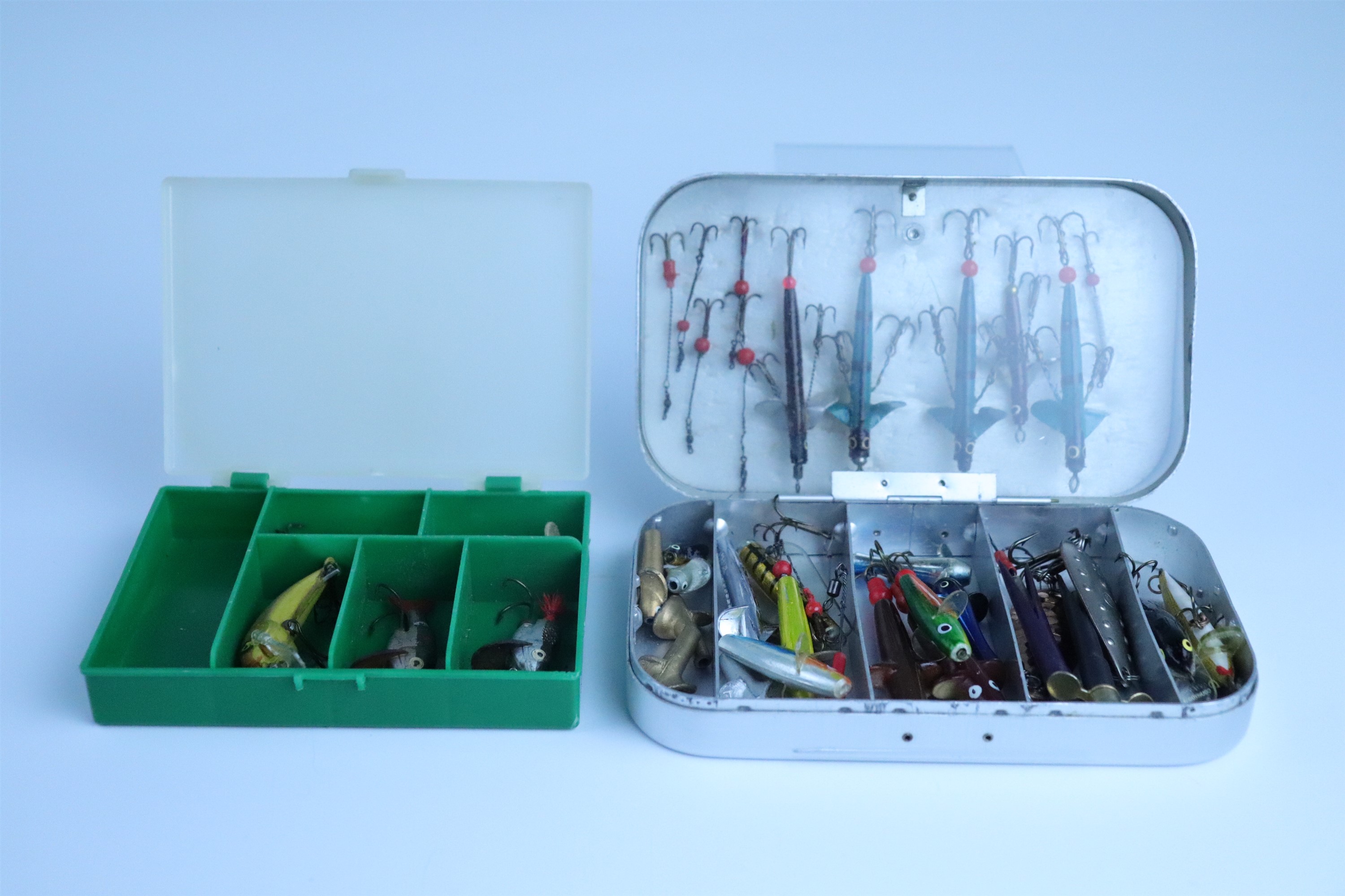 A Wheatley tackle box including spinners etc