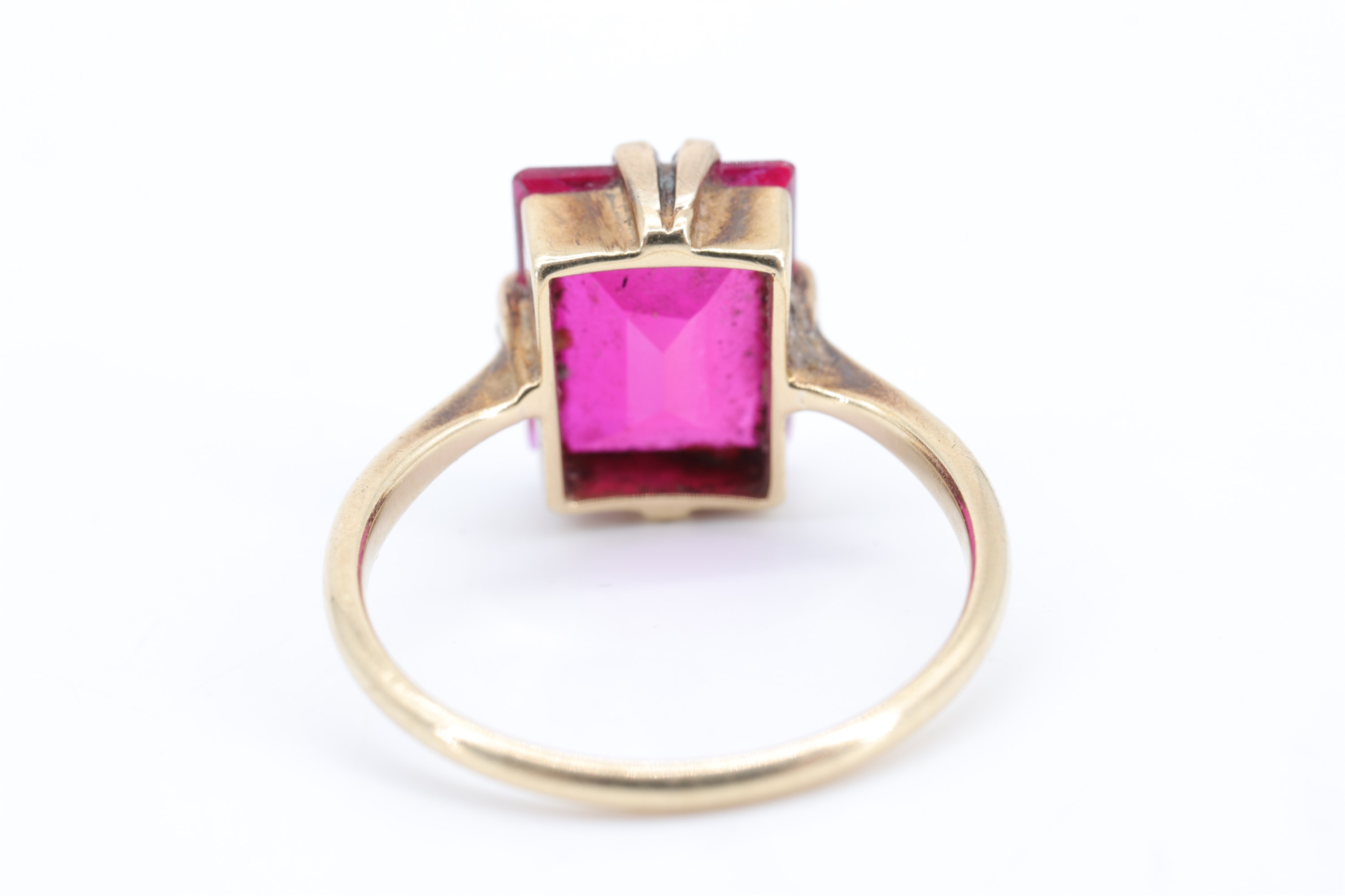 A vintage ruby cocktail ring, the baguette-cut stone of approx 4 ct, claw-set on a rectangular - Image 3 of 4