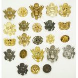 A quantity of US army cap badges