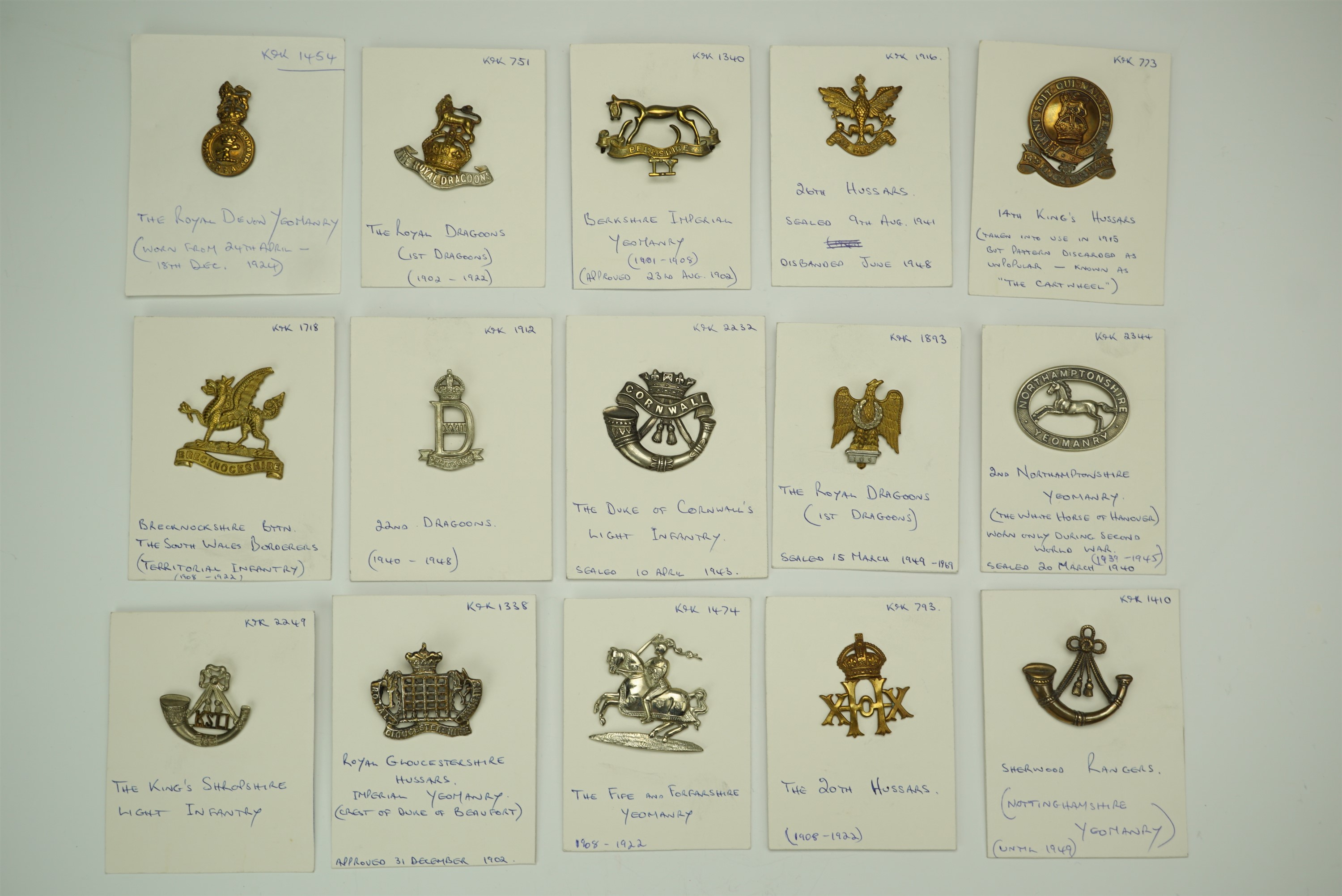 A group of cavalry and yeomanry cap badges