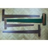 Four large 20th Century draughtsman's T squares / rulers, largest 113 cm