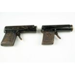 Two novelty tinplate pistol form torches, circa 1930s