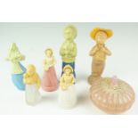 A collection of vintage Avon Cosmetics plastic figural toiletry / perfume bottles, together with