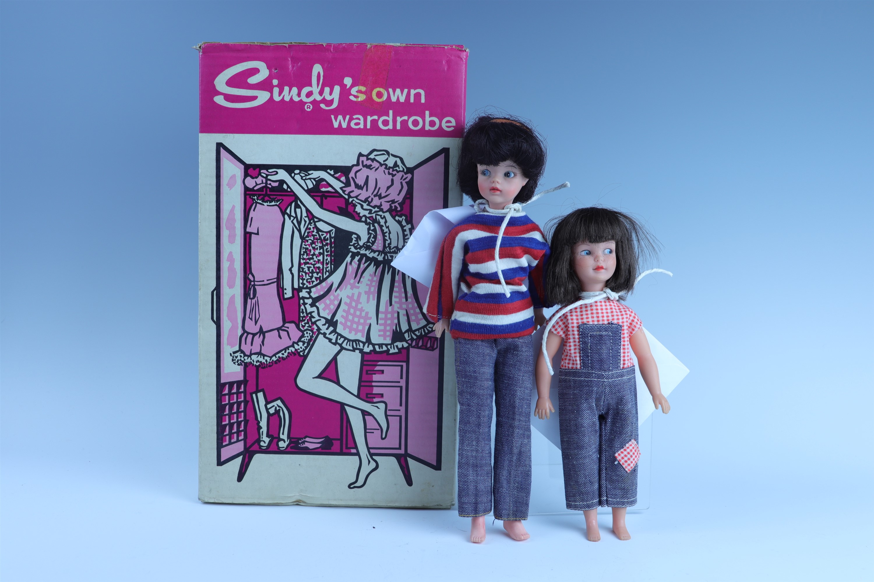 A 1960s Sindy dolls together with clothing, a wardrobe and other accessories
