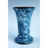 An early 20th Century Schofield Wetherriggs Pottery, Penrith slipware trumpet vase, 14 cm