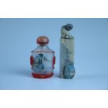 A Chinese snuff bottle, together with a soapstone wax seal and a potentially classical Egyptian