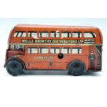 A 1950s Wells' Brimtoy "Pocketoy" clockwork tinplate London Transport bus, 11 x 3.45 x 5.5 cm