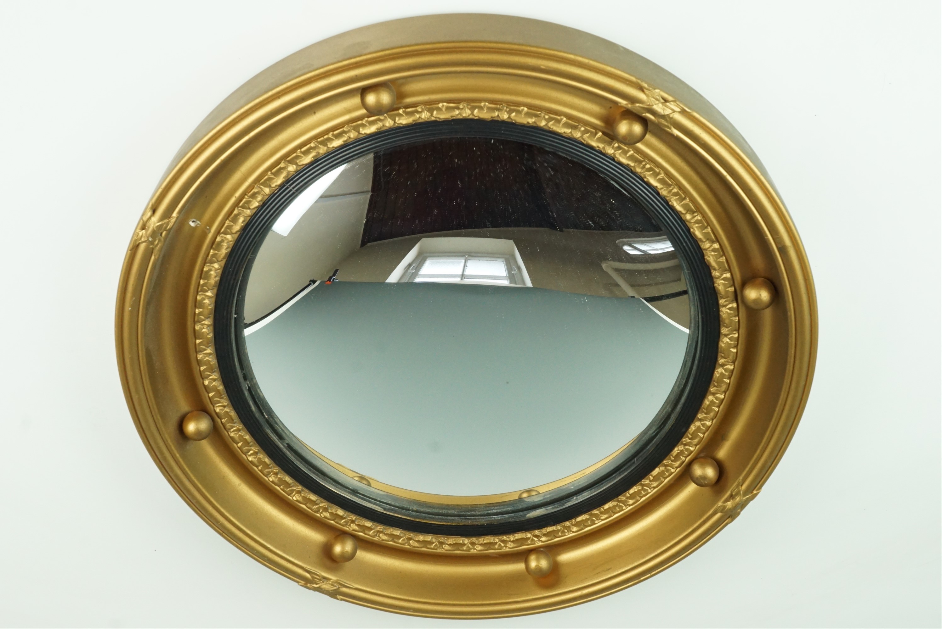 A Regency style circular wall mirror, (a/f)
