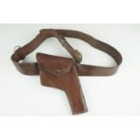 An Army officer's Sam Browne belt and holster, 135 cm