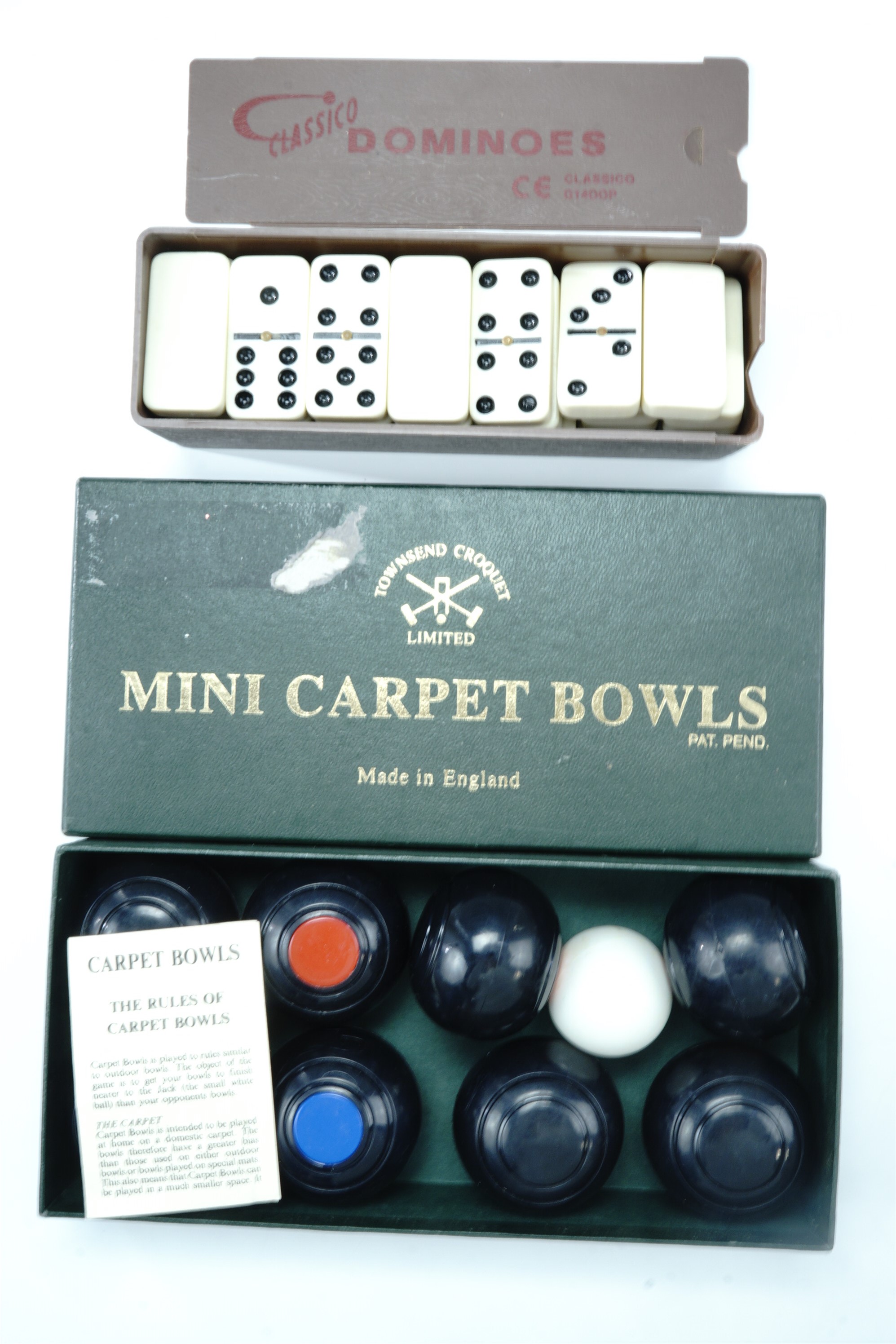 Miniature carpet bowls together with Classico dominoes