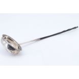 A Georgian silver toddy ladle, having a twisted baleen handle, 35 cm